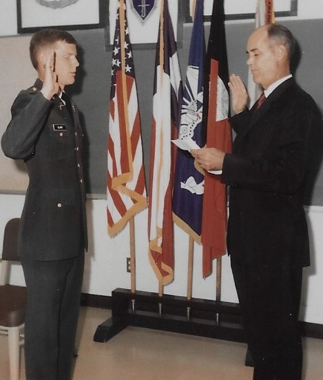 Clark being sworn in by his father, Texas Tech University